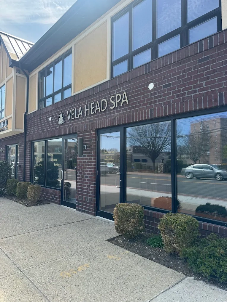 The serene treatment space at Vela Head Spa