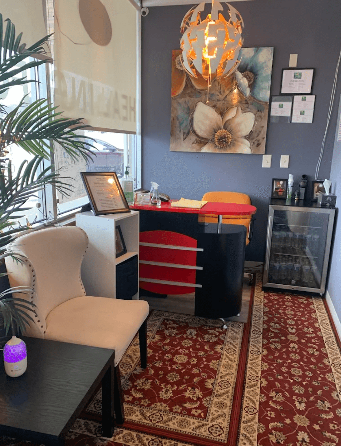 Warm and welcoming reception and waiting area at New Healing Massage